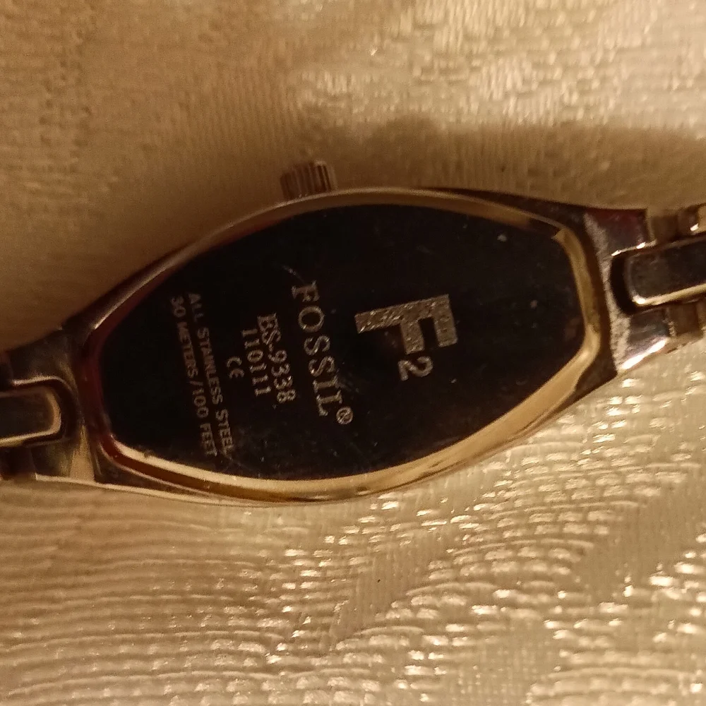 Fossil ES9338 rhinestone face silver bracelet watch